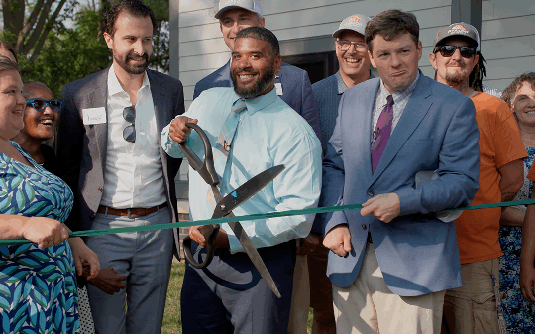 a ribbon cutting ceremony for The Grove
