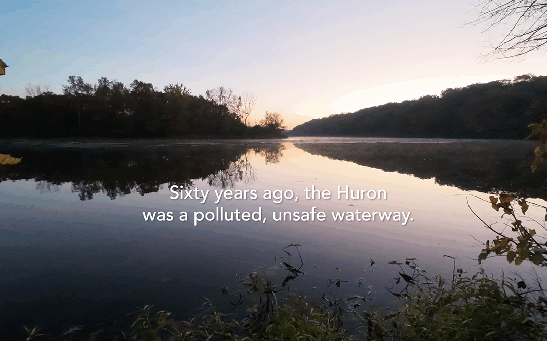 Huron River with text overlay saying "60 years ago the Huron was a polluted river way"
